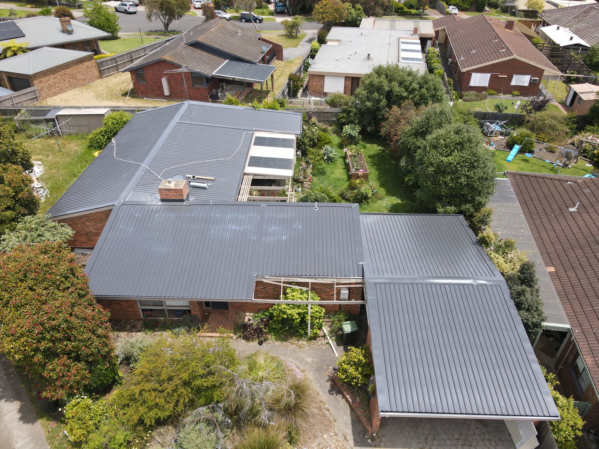 Parapet/gable works — membrane tray under flashings, tidy finish.