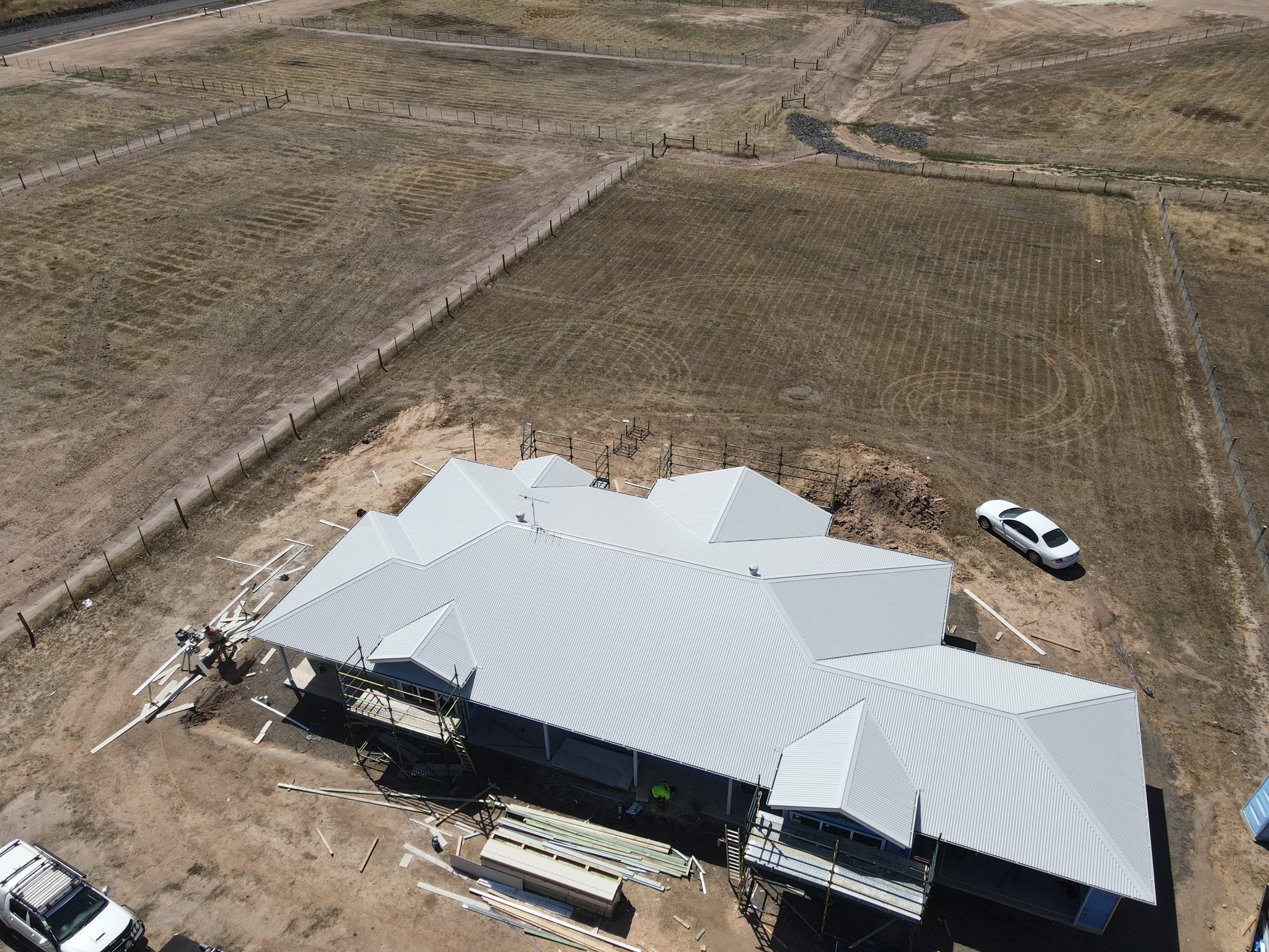 Re‑roof & addition — matching profiles, correct valley terminations.